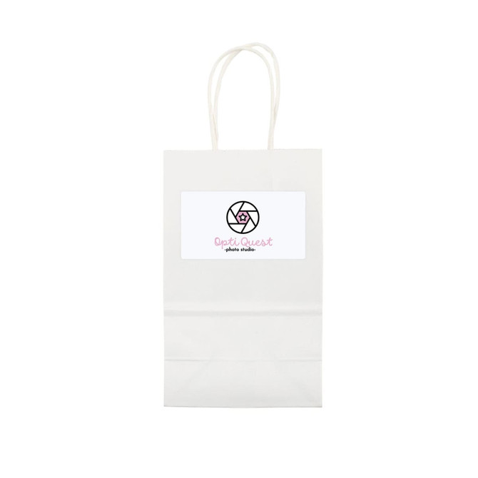 A small white paper bag with two handles and a logo on the front.
