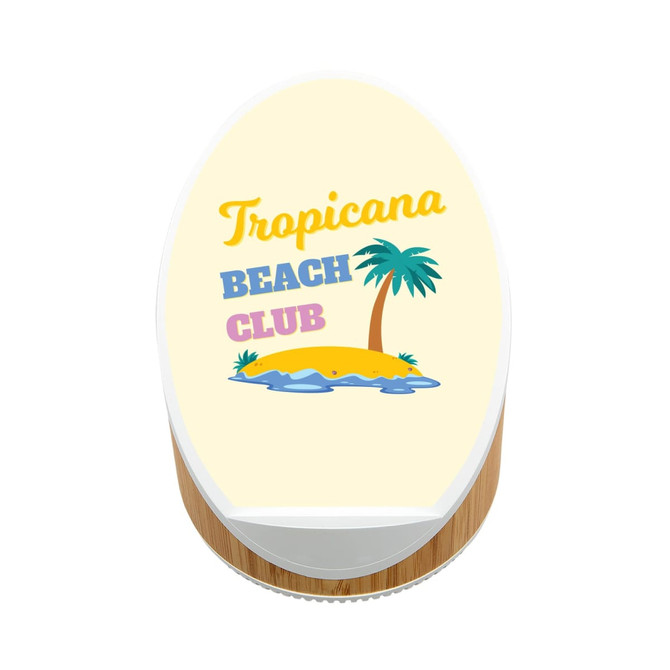 A wireless speaker and charger featuring a beach-themed design with a palm tree and island motif. The base is made of bamboo.