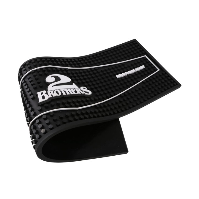A moulded PVC bar runner in black, featuring a textured surface and a logo.
