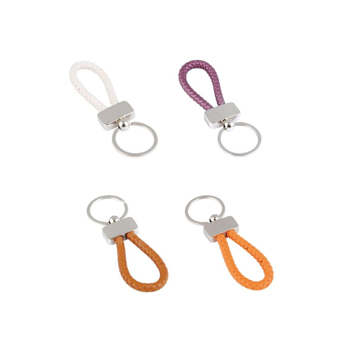 A set of four metal keyring tags featuring leather loops in cream, purple, orange, and brown colours.