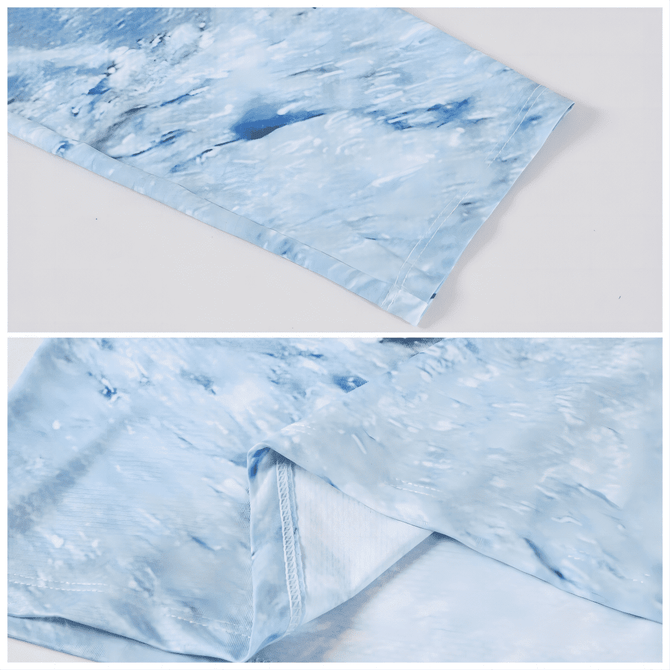 A light blue polo shirt with a sublimated wave design, featuring a logo on the chest area.