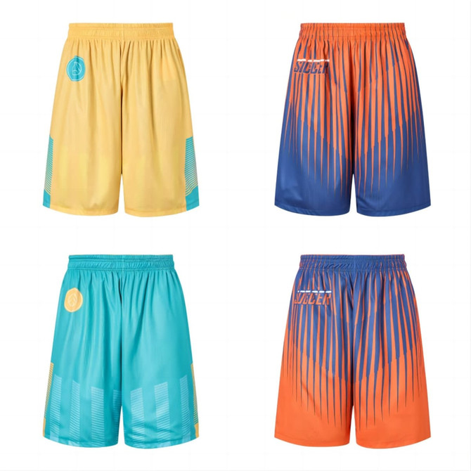 Reversible basketball shorts in yellow and teal, and blue and orange, with a logo on each pair.