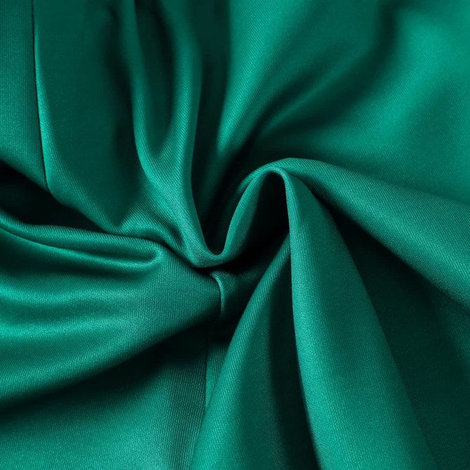 A close-up of smooth, teal fabric showcasing its softness and sheen, suitable for sporty bottoms.