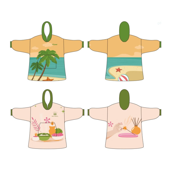 A wearable blanket in beige and green with beach-themed designs, including palm trees and decorative elements, featuring a logo.