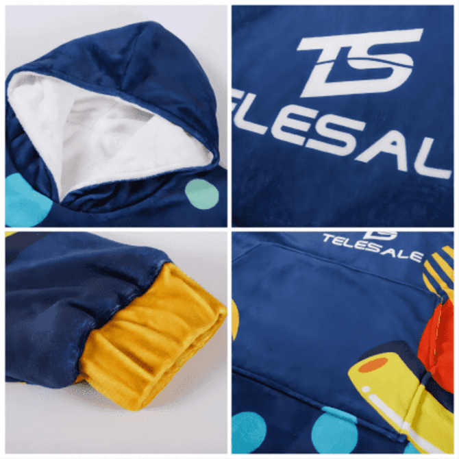 A unisex wearable blanket in navy blue with a white absorbent lining and vibrant, colourful patterns. Features a hood and logo.