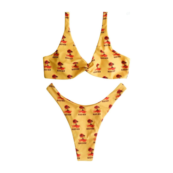 A yellow bikini bottom with a palm tree pattern and a logo. It features a high-cut design.