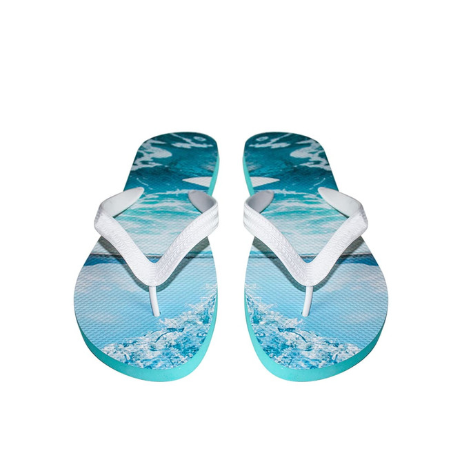 A pair of rubber thongs featuring a blue water design and white straps, with a logo on the sole.