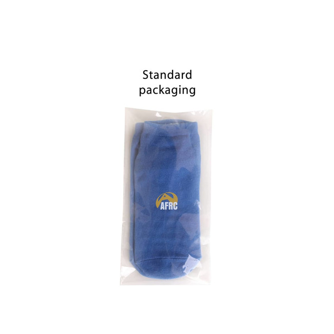 A pair of low cut blue socks packaged in clear plastic, featuring a logo on one sock.