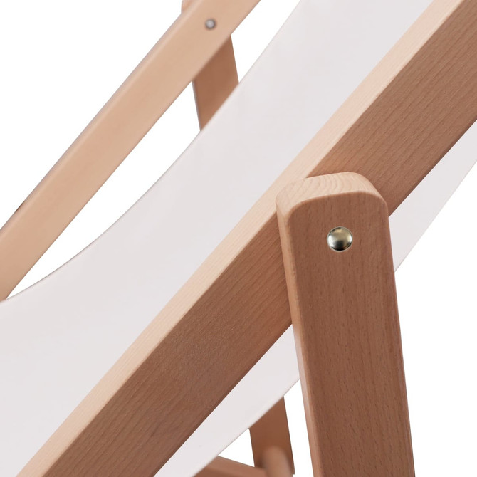A beech-framed beach chair featuring a white fabric seat, showcasing wooden supports and a minimalist design.