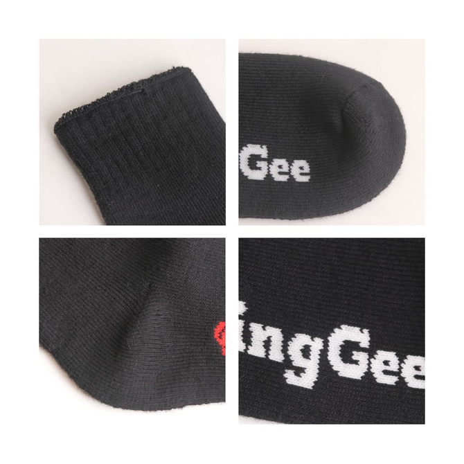 Crew woven bamboo work socks in black, featuring a logo. The fabric has a textured finish and reinforced areas.