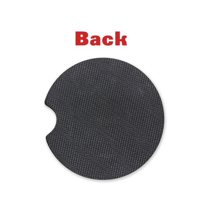 A round black car coaster featuring a textured pattern and a cut-out design, with a logo present.
