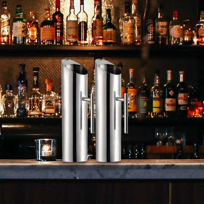 A 2L stainless steel pitcher with a sleek design, placed on a bar countertop, alongside a second pitcher.