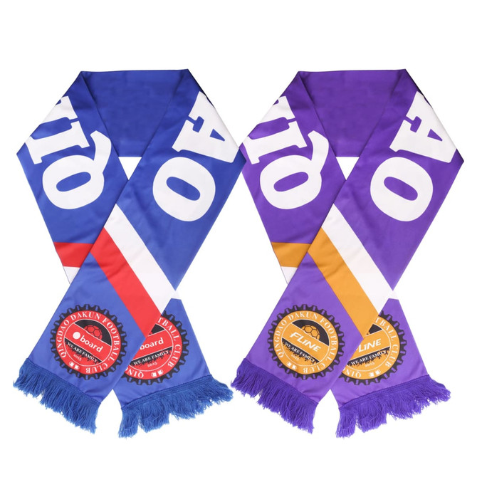 Two knitted polyester scarves in blue, red, and purple with fringed edges and logos on the ends.