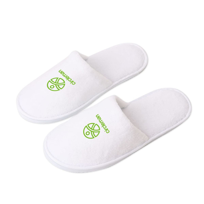White hotel slippers with a logo, featuring a soft texture and open-toe design.