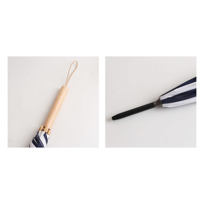 A striped RPET umbrella with a straight wooden handle and a black tip. The umbrella is partially closed.