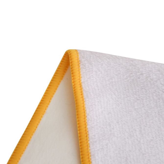 A white sports towel with a vibrant yellow border, featuring a textured surface and a logo in one corner.