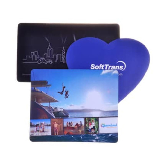 A heart-shaped purple mouse mat and two rectangular mouse mats with colourful images and a skyline design, featuring a logo.