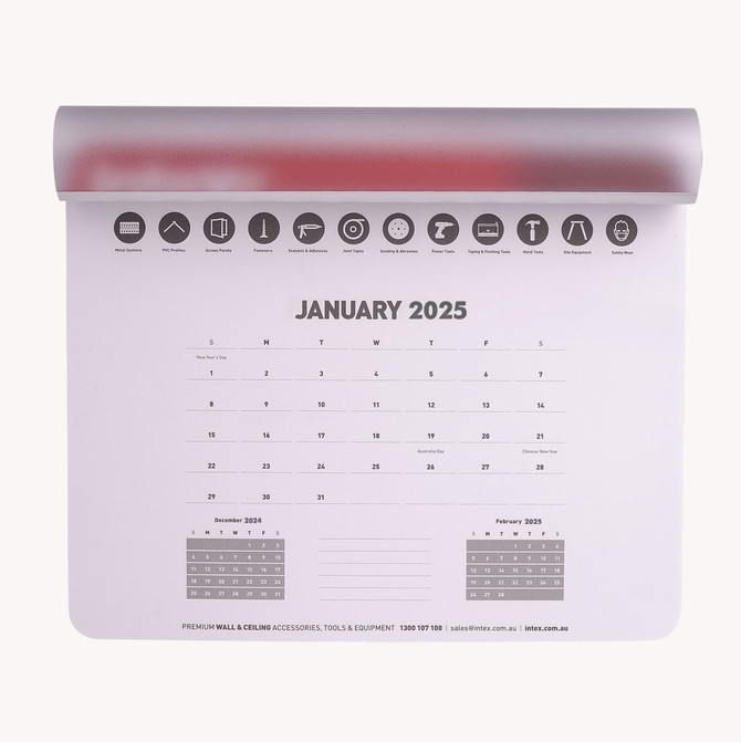 A mouse mat in white with a 2025 calendar layout, featuring a grey edge and icons across the top.