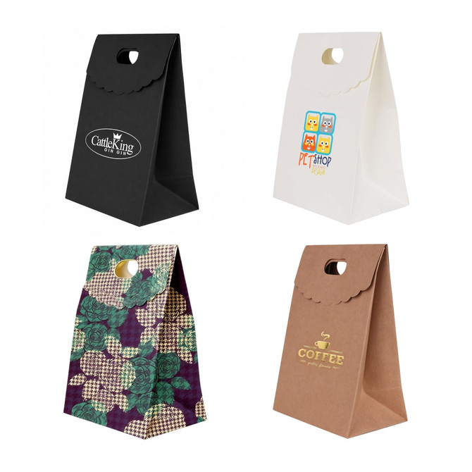 A collection of die cut handle bags in black, white, purple, and brown, featuring various designs and logos.