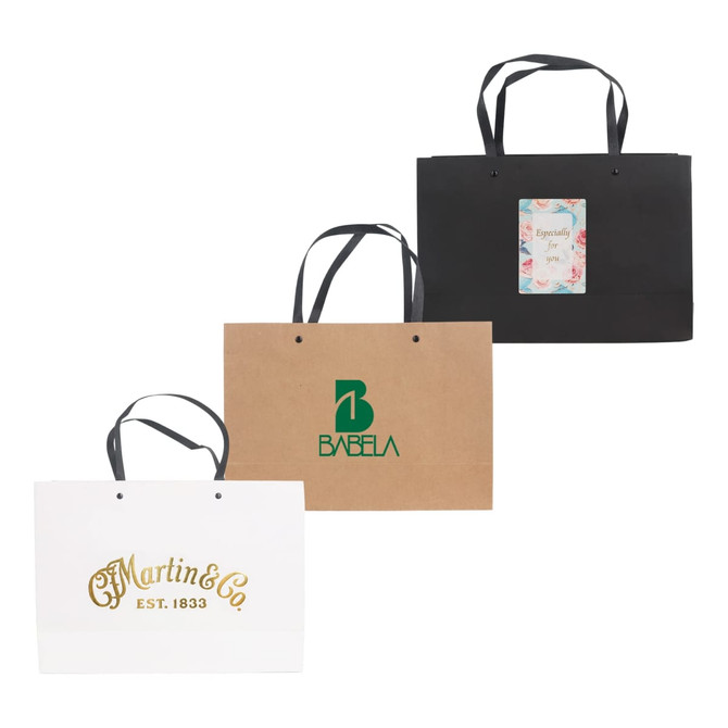 Medium paper bags in black, brown, and white with knitted handles and logos displayed.