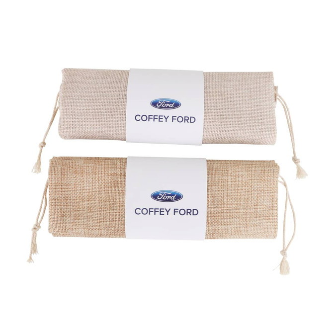 Two jute produce bags, one in light beige and one in a slightly darker beige, both featuring a logo.