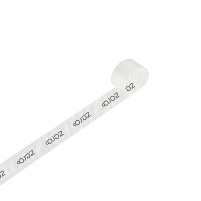 A roll of 22mm width ribbed fabric ribbon in light cream with a logo band displayed.