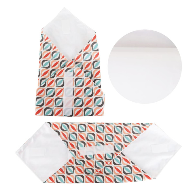A reusable food wrap featuring a vibrant pattern in coral, teal, and grey colours, with a white backing.