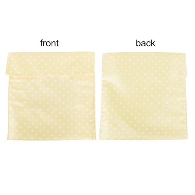 A reusable food pouch in yellow with white polka dots and a Velcro closure, featuring front and back views.