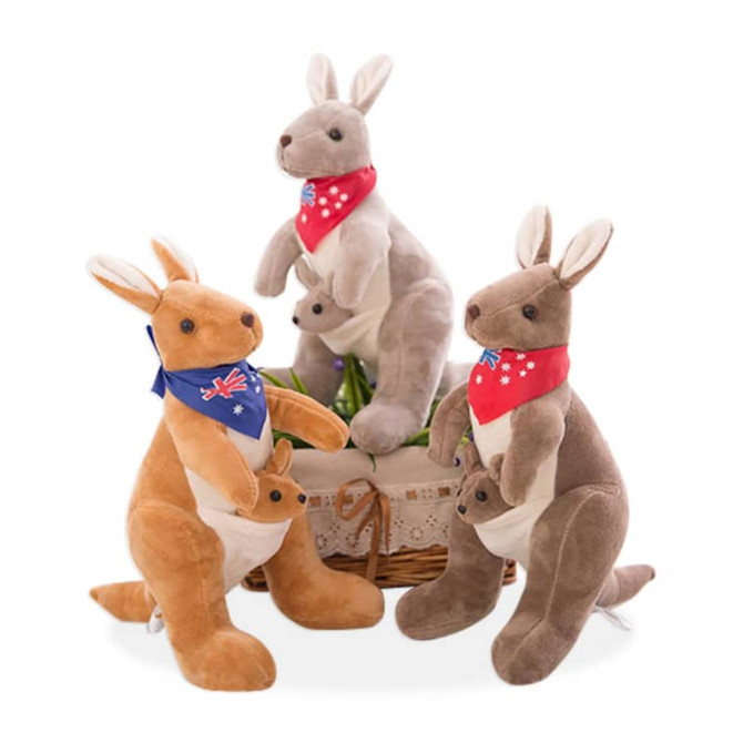 A collection of three plush kangaroo toys in brown and grey, each wearing a bandana, sitting together in a basket.