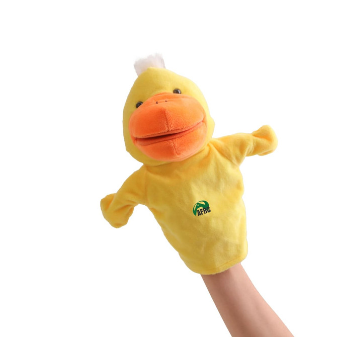 A yellow duck hand puppet with an orange beak and a small tuft of white on its head, featuring a logo on the body.