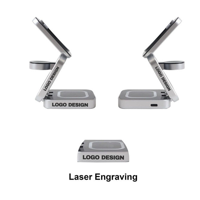 A foldable wireless charger stand in silver, featuring a sleek design and an engraved logo.