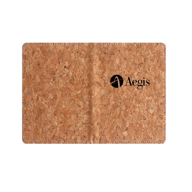 A cork passport holder in a natural shade, featuring a logo on the front.