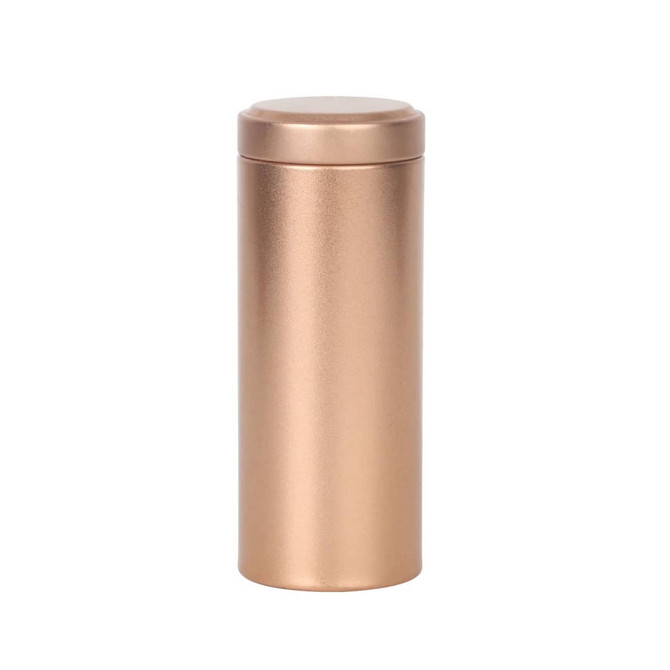 A large bronze metal cylinder tin canister with a smooth finish and a secure lid.