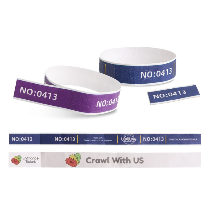 Tabbed disposable Tyvek wristbands in purple and white with a textured design, featuring various sizes and a logo.