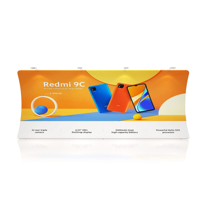 A U-shaped tension fabric display wall featuring vibrant colours and images of smartphones, with a logo at the top.