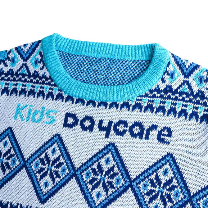 A blue and white unisex winter acrylic cotton jacquard sweater with a decorative pattern and a logo.