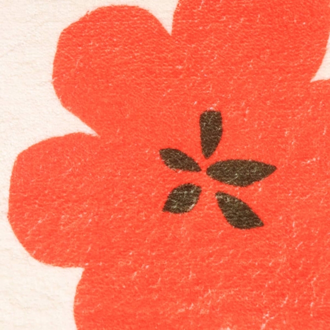 A vibrant orange flower design with dark green leaves on a light background, featuring a textured surface.