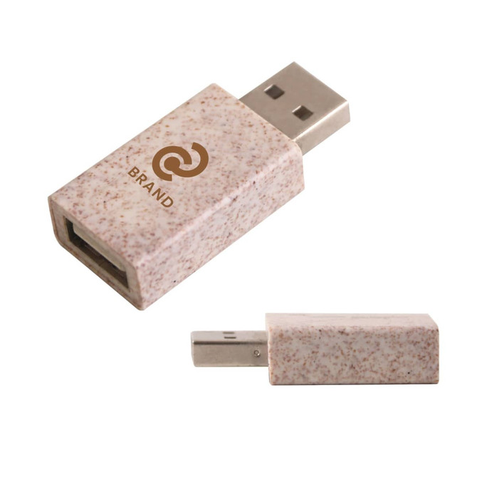 A wheat straw USB data blocker in a speckled beige colour, featuring a logo on the surface.