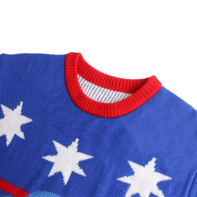 A blue unisex winter acrylic jacquard sweater with red trim and white star patterns. Features a logo.