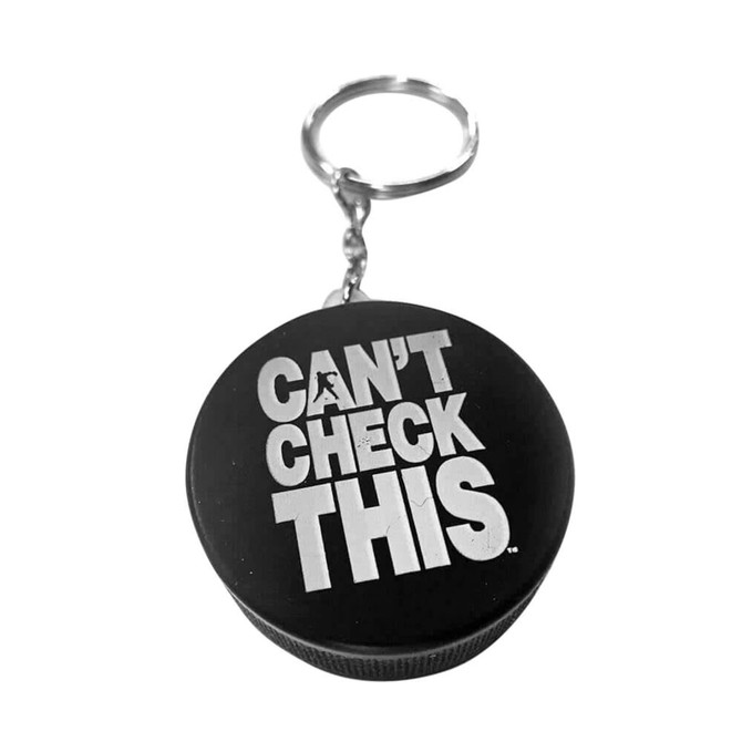 A black keyring featuring a hockey puck stress reliever with white text and a metal attachment.