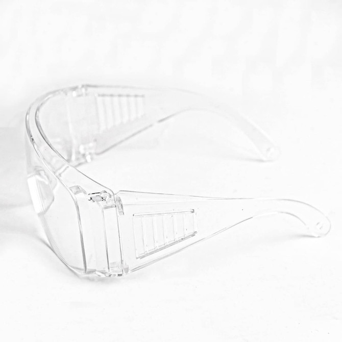 Clear anti-fog safety protective goggles with a sleek design and a logo on the side.