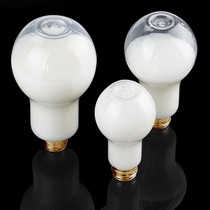 A drink bottle designed in a bulb shape, featuring a clear top and a white base. Includes a logo.