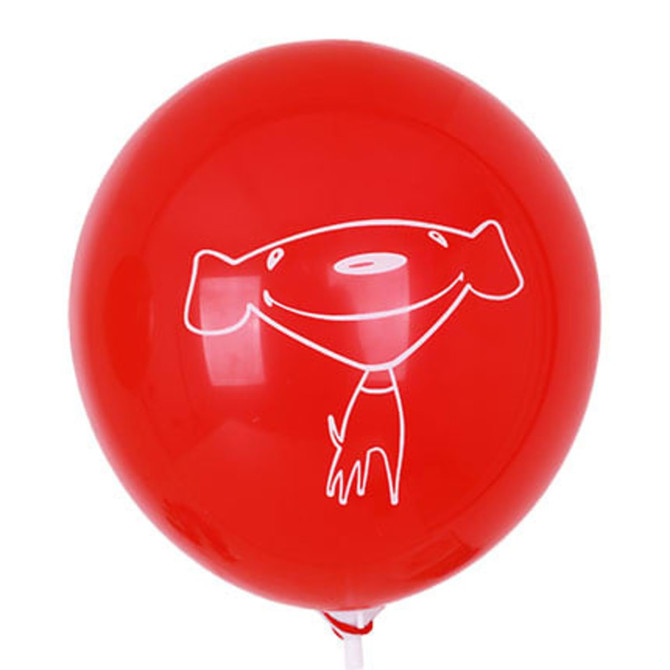 A red balloon with a smiling dog illustration in white, featuring a scarf and a playful design.