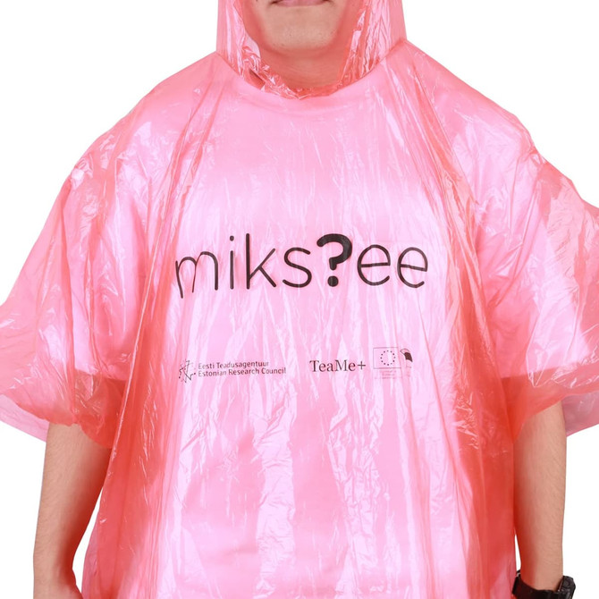 A pink poncho made of lightweight plastic, featuring a logo and worn by a person.