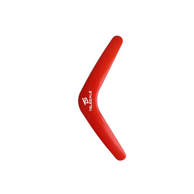 A red V-shaped boomerang toy with a logo, designed for outdoor fun and games.