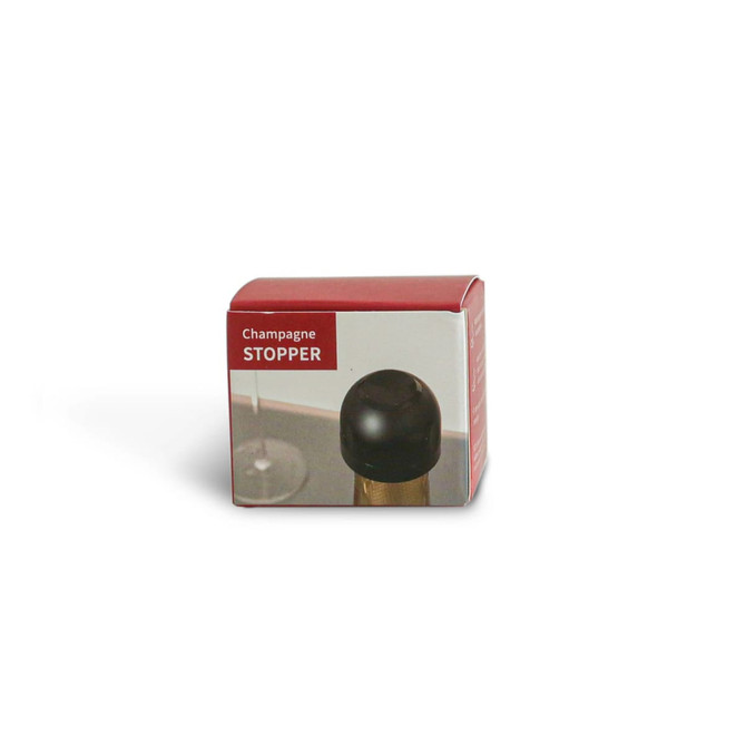 A drink bottle stopper in black, presented in a red and white box, with a logo visible on the packaging.