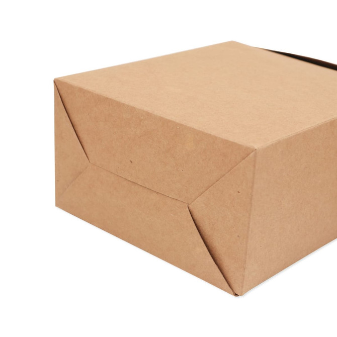 A medium kraft paper portable box with a simple fold design and a natural brown finish. It includes branding elements.