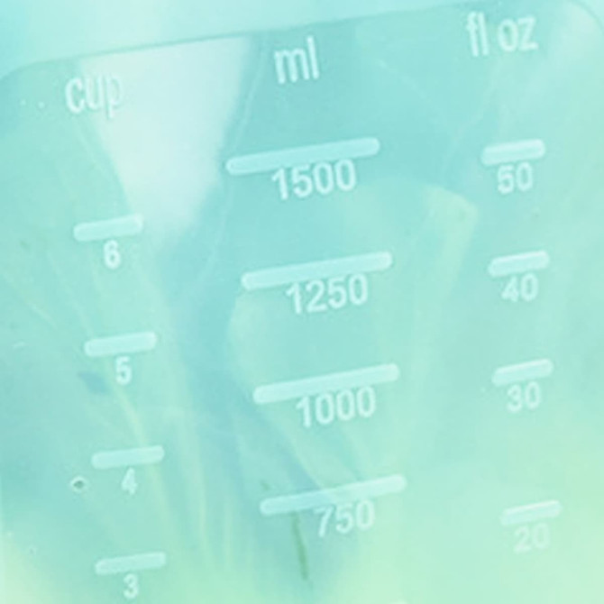 A transparent silicone storage pouch with measurement markings up to 1500ml and a logo.