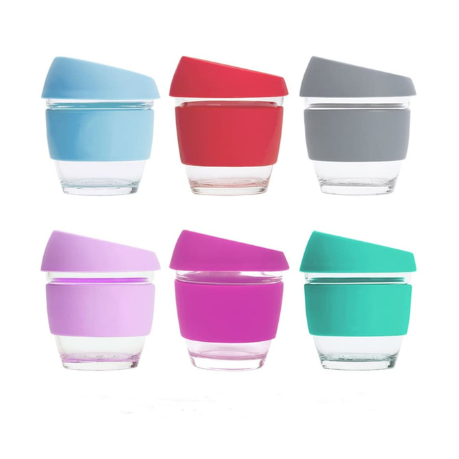 A set of six 8 oz reusable glass coffee cups in blue, red, grey, purple, pink, and teal, each with a silicone lid and sleeve.