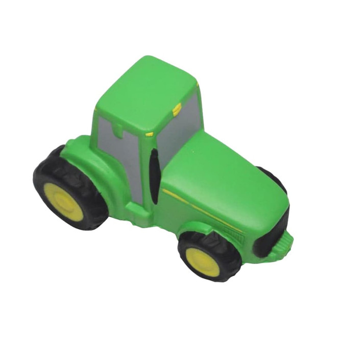 A green tractor-shaped stress reliever with black tyres and yellow accents. It has a simple, cartoonish design.